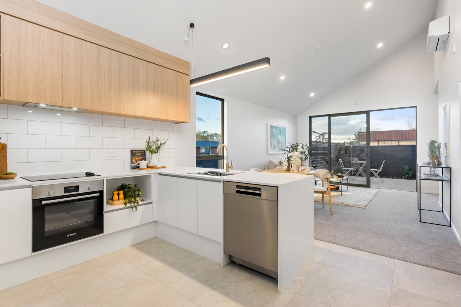 Light-filled kitchen and open-plan living space at Notre Dame Living